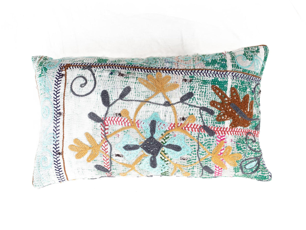 Unique suzani pillowcase 30x50 cm in white and green with colorful embroidered flowers and winding patterns in boho vintage oriental style