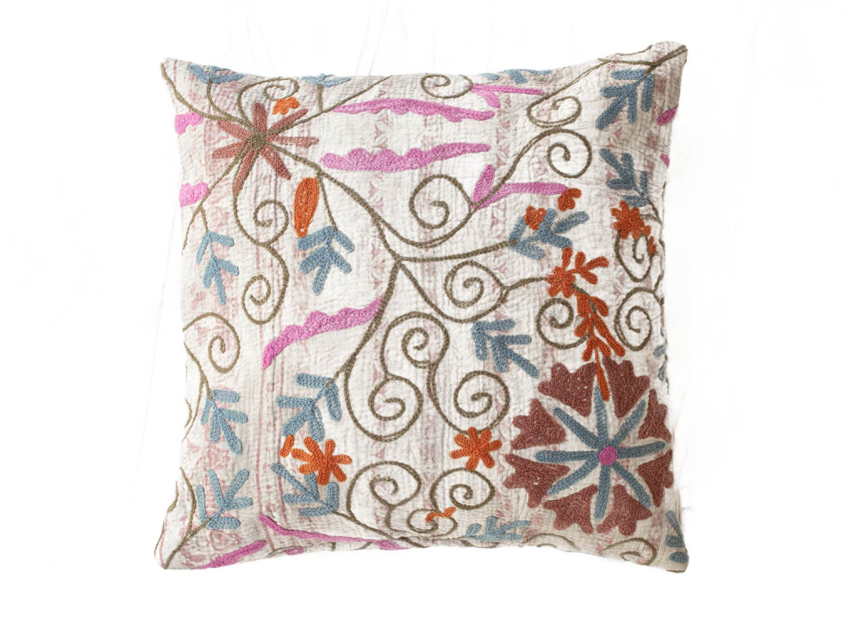 Unique suzani pillowcase 50x50 cm in white with colorful boho embroidery of winding patterns and flowers in pink, blue, orange and brown shades